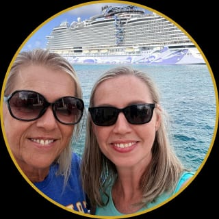 Linda and Jessica together beside a cruise ship
